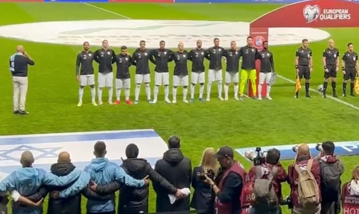 Israel's players pictured singing their national anthem before drawing 1-1 with Switzerland in a Euro 2024 qualifier in November 2023